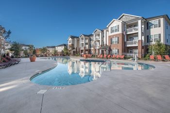 Resort style pool with sun deck